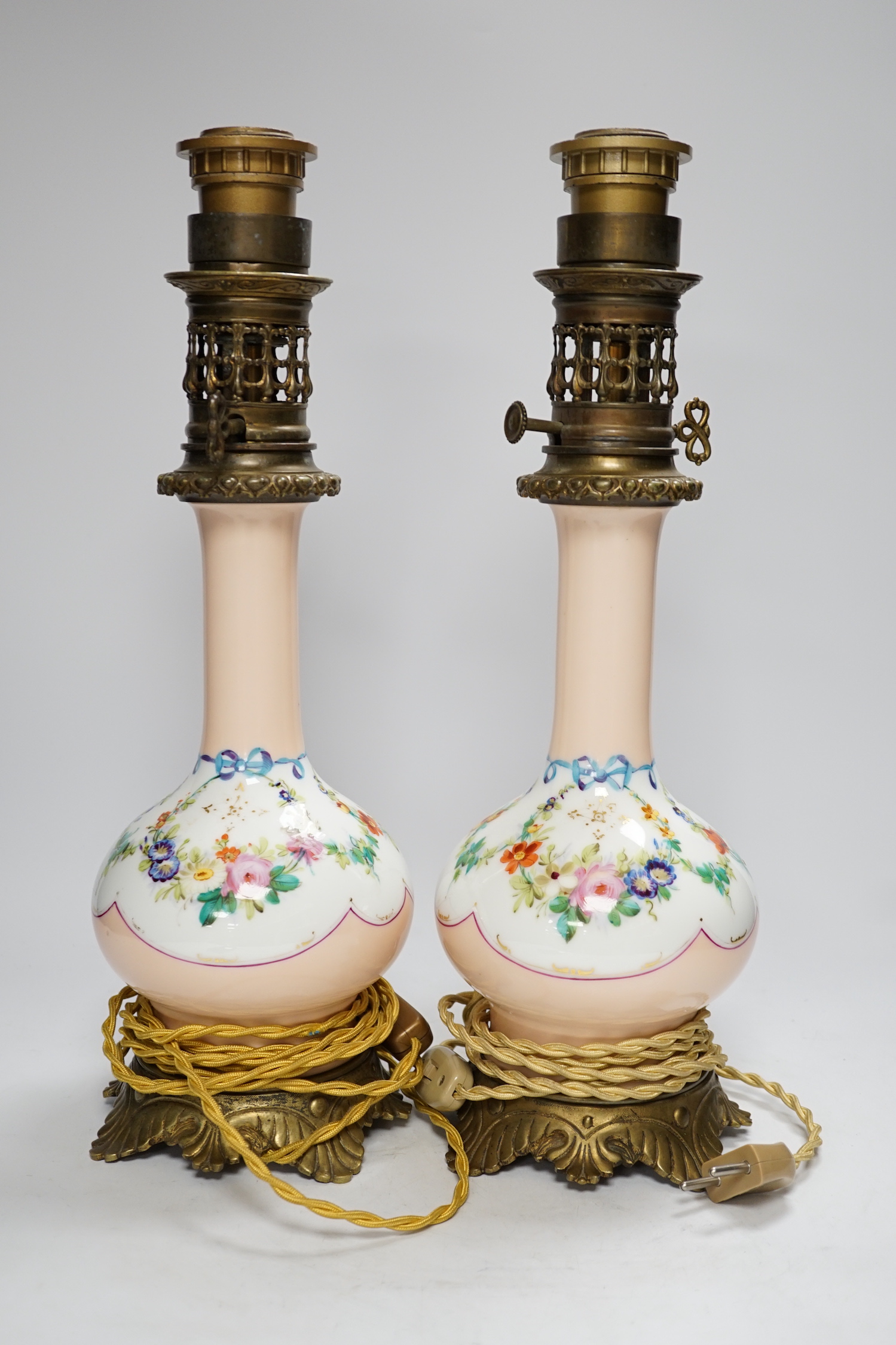 A pair of French brass mounted porcelain table lamps, 42cm